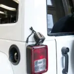 Halter für Scheinwerfer auf der Rückleuchte