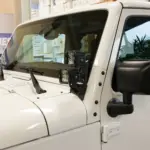 Halter für Scheinwerfer am Scheibenrahmen double